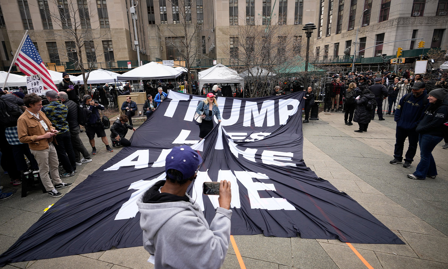 Protestors outside the courthouse in Manhattan where Trump was charged.