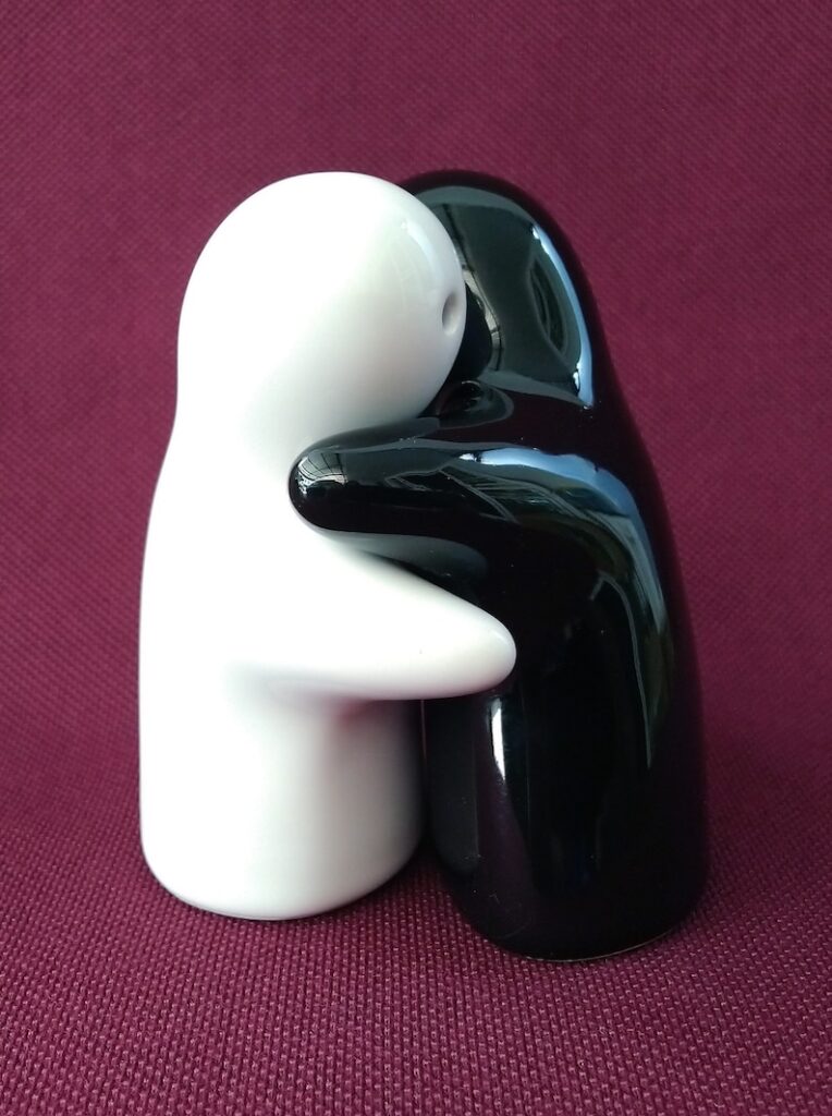 Hugging salt and pepper shaker