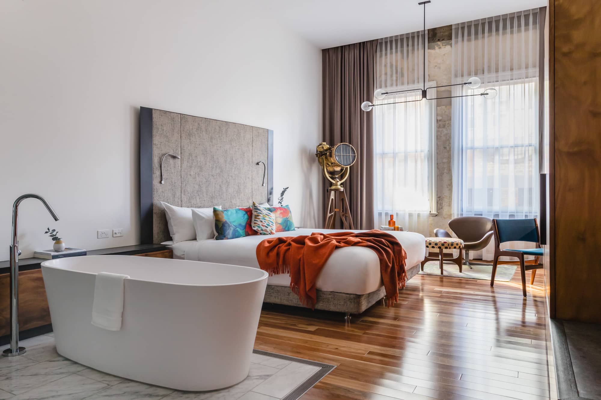 Hotel bedroom with bath tub