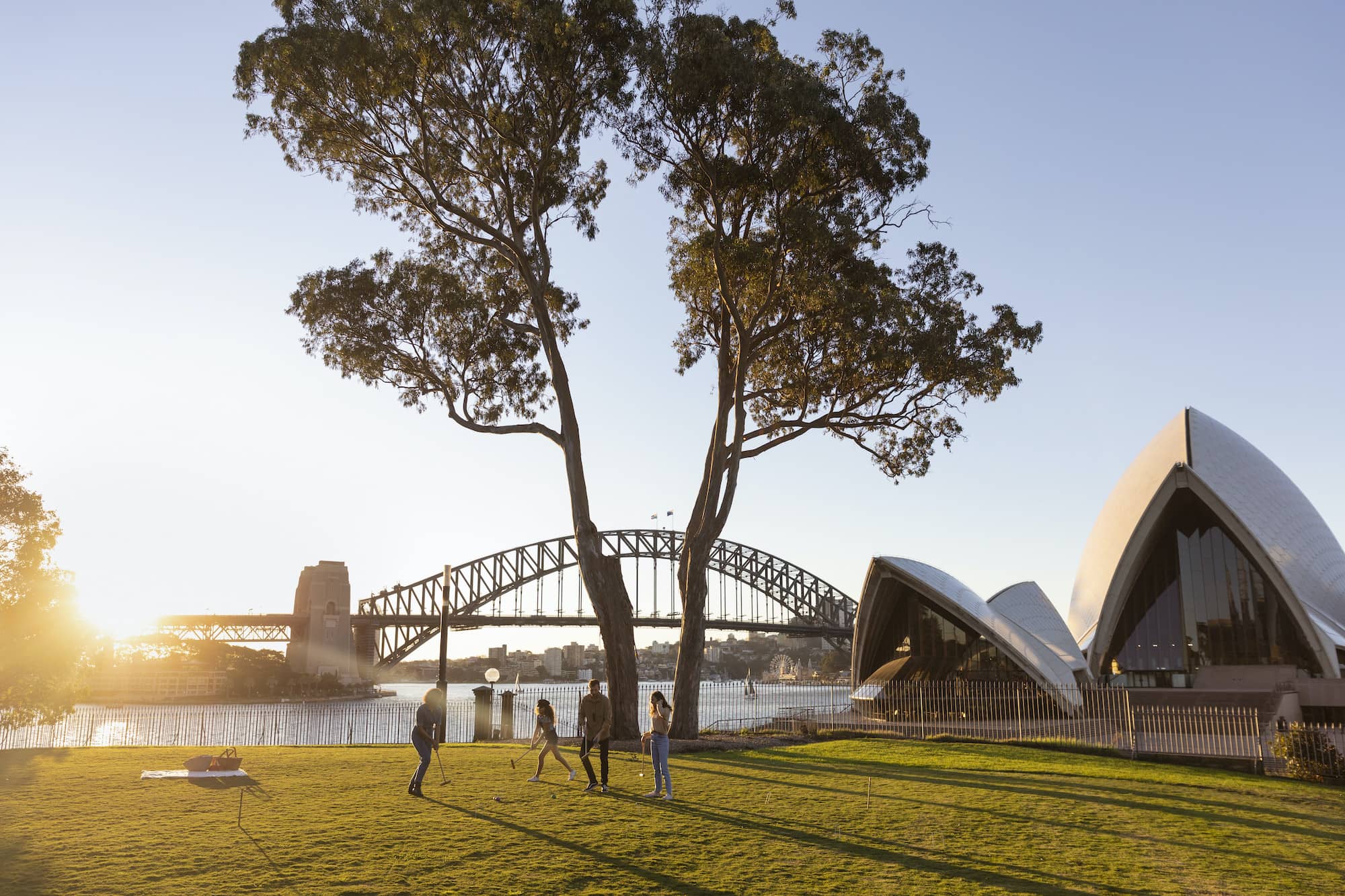 Family enjoying a day out in the Royal Botanic Garden, Sydney.