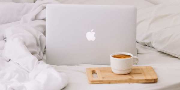 Laptop on bed