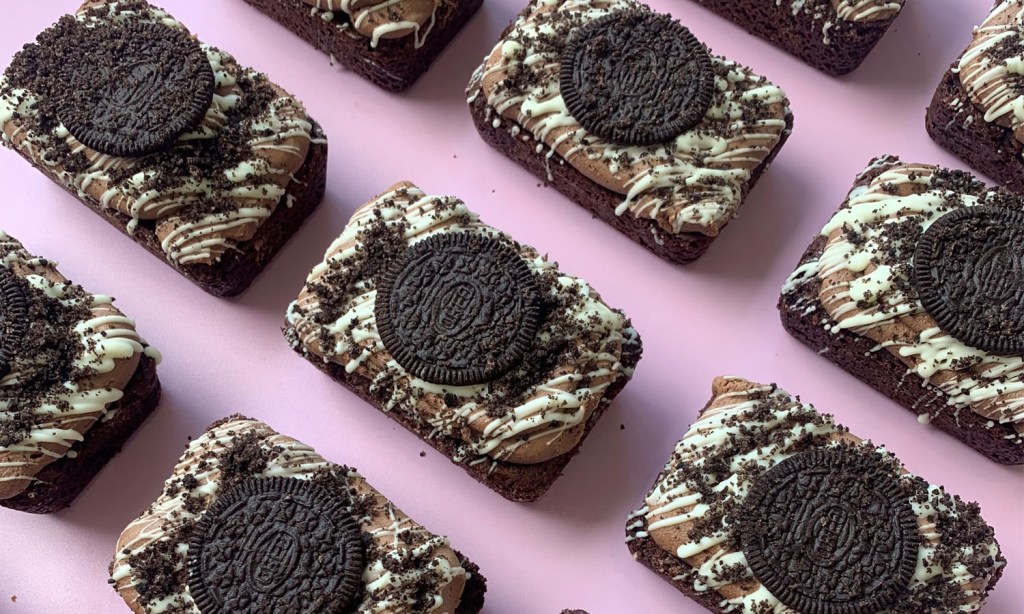 oreo biscuits cake on pink background sweet indulgence by mon