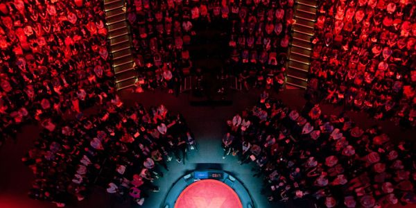 An image showing someone speaking at TEDxSydney