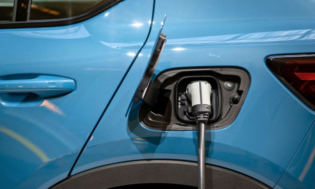 An image of an EV car charging to illustrate the fact EV charging will no longer be free on the NRMA