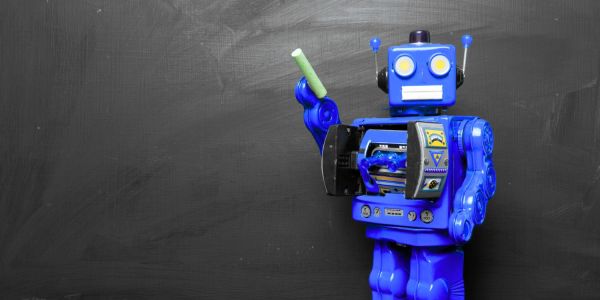 An image of a robot teaching to illustrate AI in education