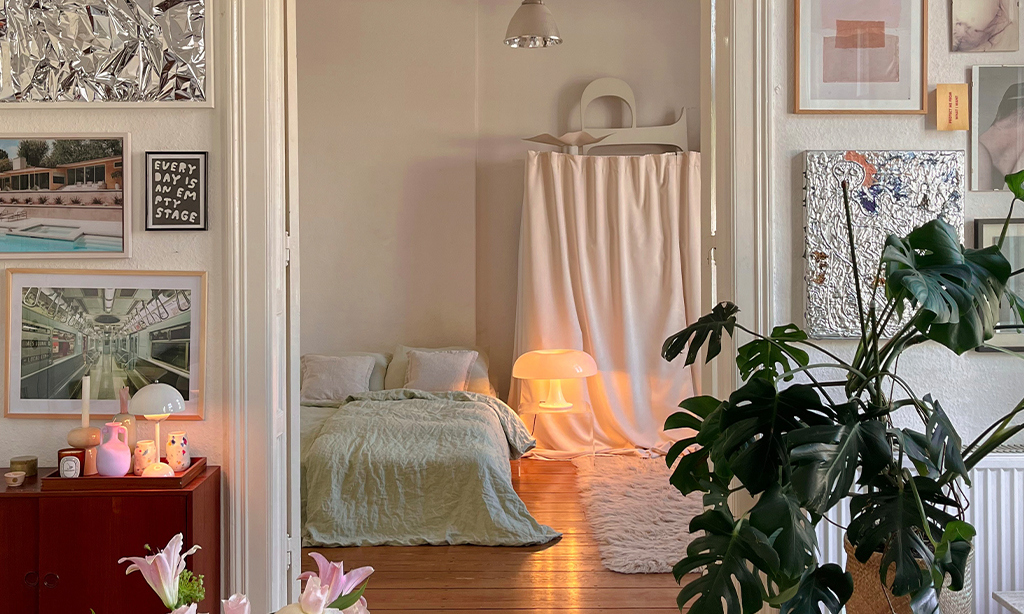 Decorated apartment peeking into bedroom