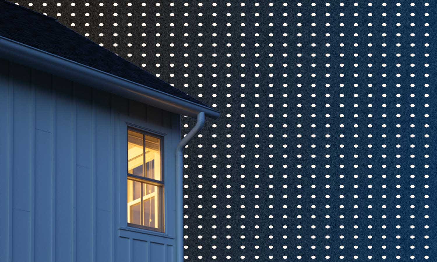 darkened house on a dark blue background with white polka dots